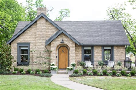 60 style yellow brick houses with metal awning|yellow brick exterior design.